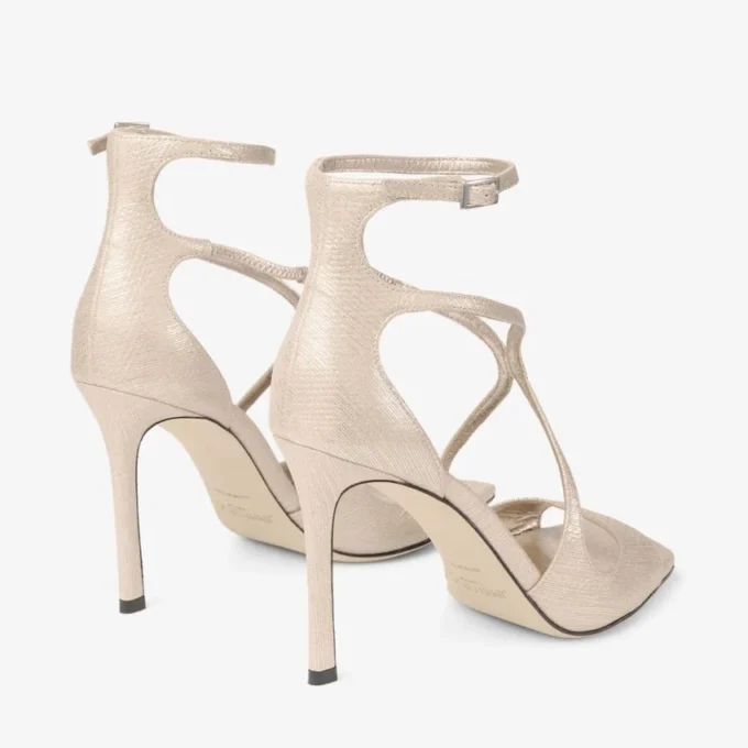 Azia 95 sandaler i guldmetalliskt läder