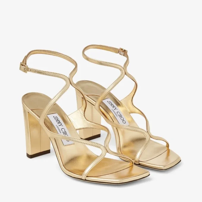 Azie 85 sandaler i guldmetalliskt nappaläder