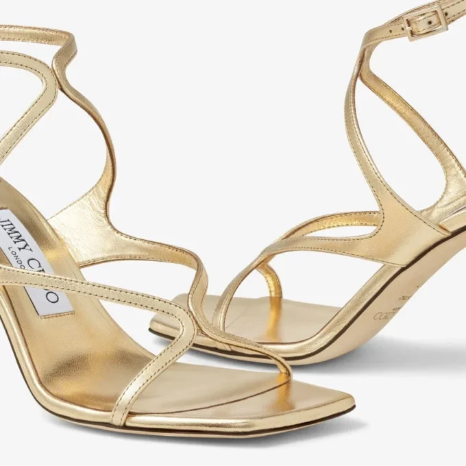 Azie 85 sandaler i guldmetalliskt nappaläder