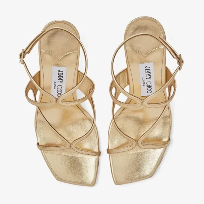 Azie 85 sandaler i guldmetalliskt nappaläder