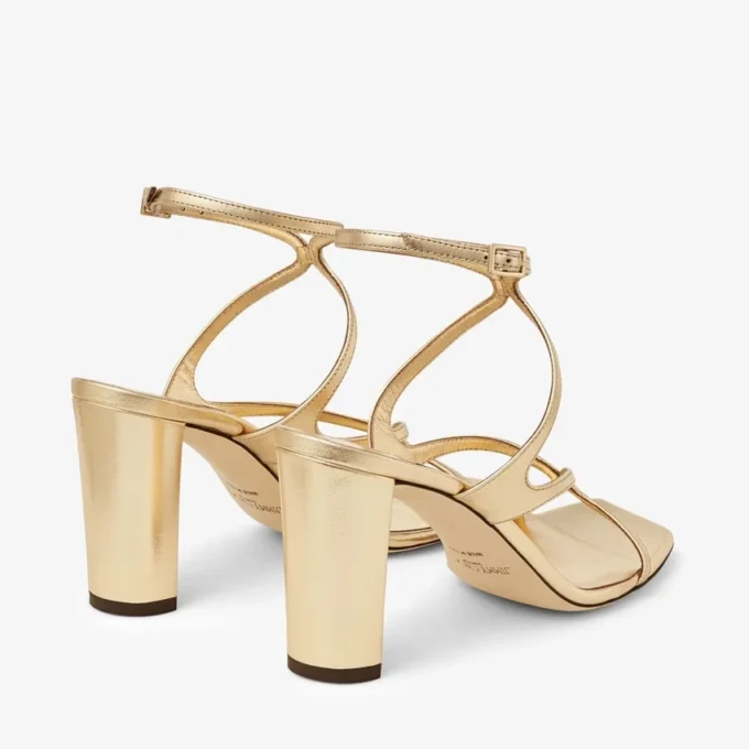 Azie 85 sandaler i guldmetalliskt nappaläder
