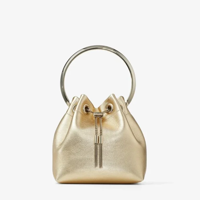 Bon Bon guldmetallisk nappaväska med metallhandtag Bon Bon guldmetallisk nappaväska med metallhandtag