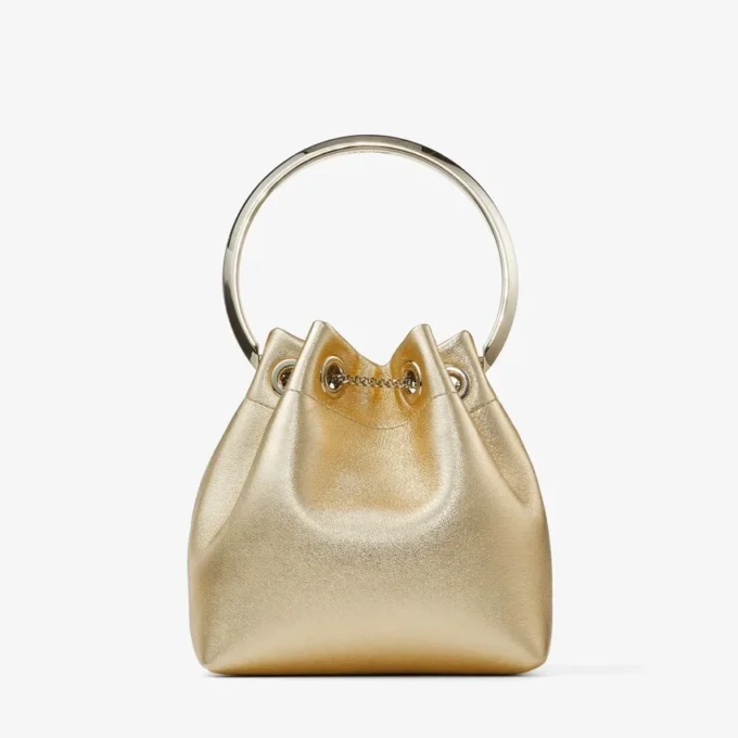 Bon Bon guldmetallisk nappaväska med metallhandtag Bon Bon guldmetallisk nappaväska med metallhandtag