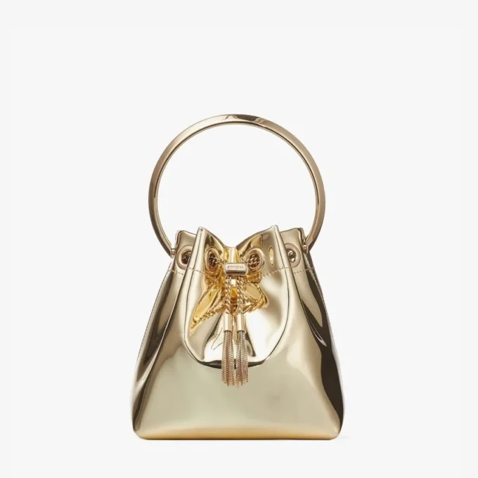 Bon Bon guldspegeltygsminiväska med metallhandtag Bon Bon guldspegeltygsminiväska med metallhandtag