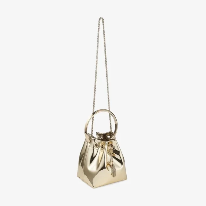 Bon Bon guldspegeltygsminiväska med metallhandtag Bon Bon guldspegeltygsminiväska med metallhandtag