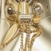Bon Bon guldspegeltygsminiväska med metallhandtag Bon Bon guldspegeltygsminiväska med metallhandtag