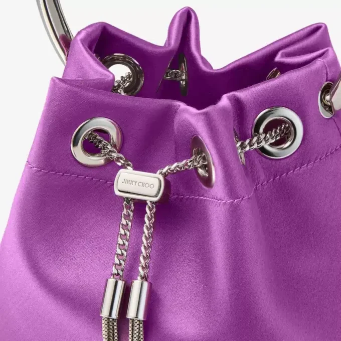 Bon Bon Violet Orchid satinhandväska med metallarmband