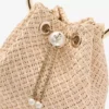 Bon Bon-väska i naturlig raffia med pärlknäppning Bon Bon-väska i naturlig raffia med pärlknäppning