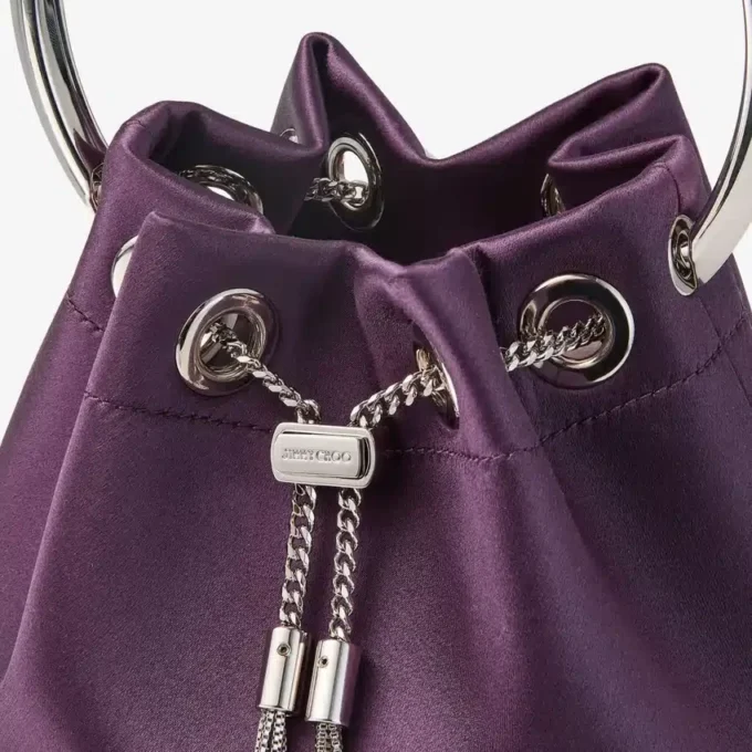 Bon Bon Winter Bloom satinhandväska med metallarmband