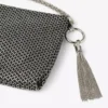 Callie svart diamantmönster med kristallhotfix på mocka-clutch