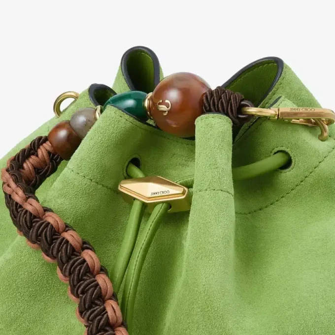 Cinch Medium Clover – axelväska i mocka med flätad pärlrem Cinch Medium Clover – axelväska i mocka med flätad pärlrem