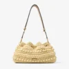 Cinch Medium naturfärgad och cappuccinofärgad raffia-bucketväska med pärlor och slätt kalvskinn Cinch Medium naturfärgad och cappuccinofärgad raffia-bucketväska med pärlor och slätt kalvskinn