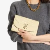 Curve Clutch Buttermilk Quiltad Bikerläderclutch Curve Clutch Buttermilk Quiltad Bikerläderclutch