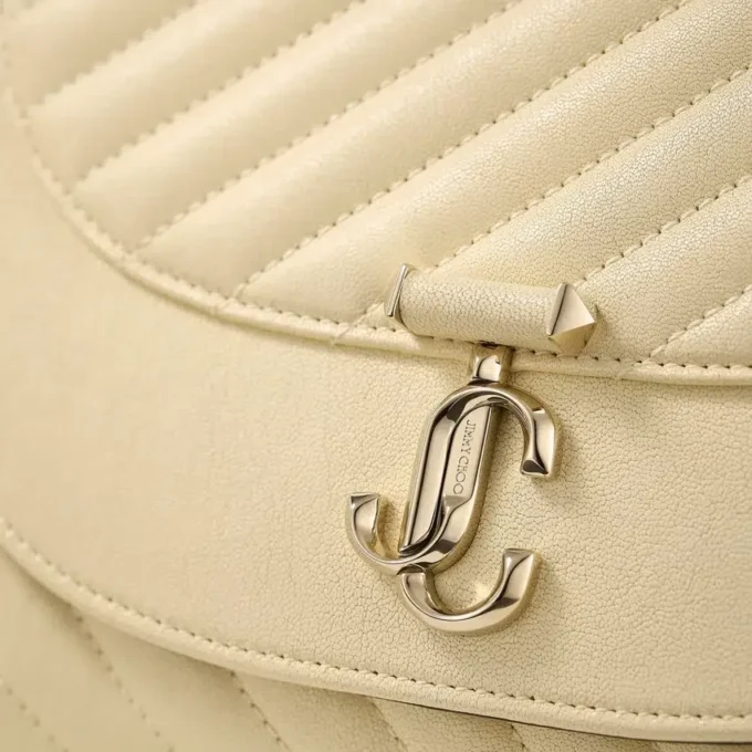 Curve Clutch Buttermilk Quiltad Bikerläderclutch Curve Clutch Buttermilk Quiltad Bikerläderclutch