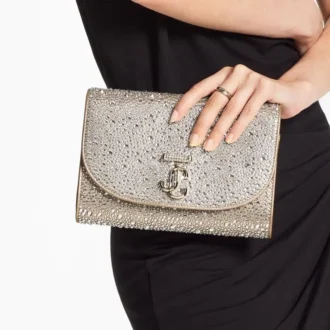 Curve Clutch Guldskimrande mockaväska med hotfix-kristaller
