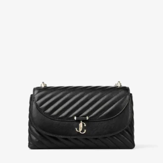 Curve Cross Body Medium Svart quiltad crossbody-väska i bikerläder