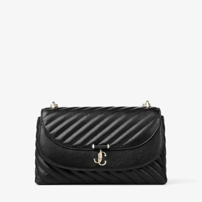 Curve Cross Body Medium Svart quiltad crossbody-väska i bikerläder