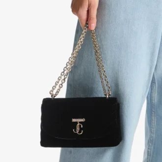 Curve Cross Body Small Svart quiltad crossbody-väska i sammet med kristall-Jc-bar