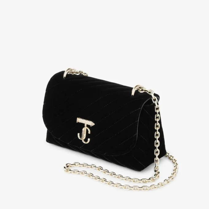 Curve Cross Body Small Svart quiltad crossbody-väska i sammet med kristall-Jc-bar Curve Cross Body Small Svart quiltad crossbody-väska i sammet med kristall-Jc-bar