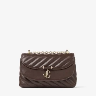 Curve Crossbody Small Chokladbrun quiltad crossbody-väska i bikerläder