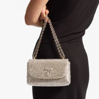 Curve Crossbody Small – guldskimrande crossbody-väska i mocka med hotfix-kristaller
