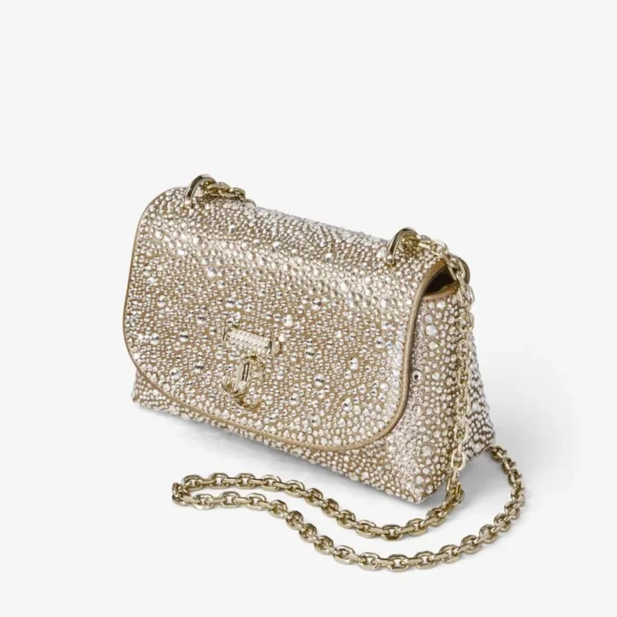 Curve Crossbody Small – guldskimrande crossbody-väska i mocka med hotfix-kristaller Curve Crossbody Small – guldskimrande crossbody-väska i mocka med hotfix-kristaller