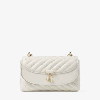 Curve Crossbody Small Latte – quiltad crossbody-väska i nappaläder