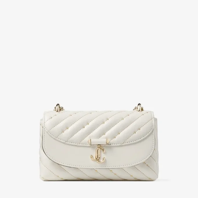 Curve Crossbody Small Latte – quiltad crossbody-väska i nappaläder