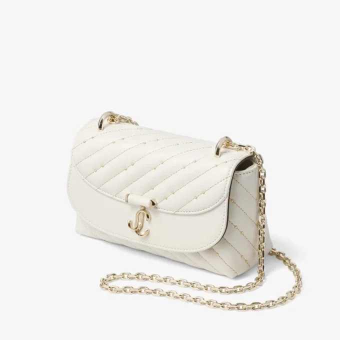 Curve Crossbody Small Latte – quiltad crossbody-väska i nappaläder
