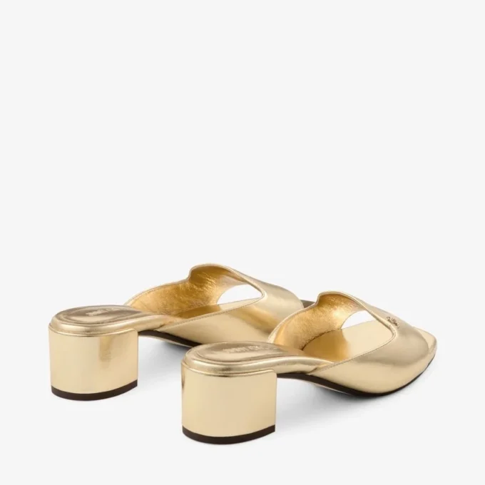 Dina 45 Mulesandaler i guldmetalliskt läder Dina 45 Mulesandaler i guldmetalliskt läder