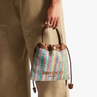 Dragsko-påse med handtag i flera färger och beige chevron-raffia med läderdetaljer