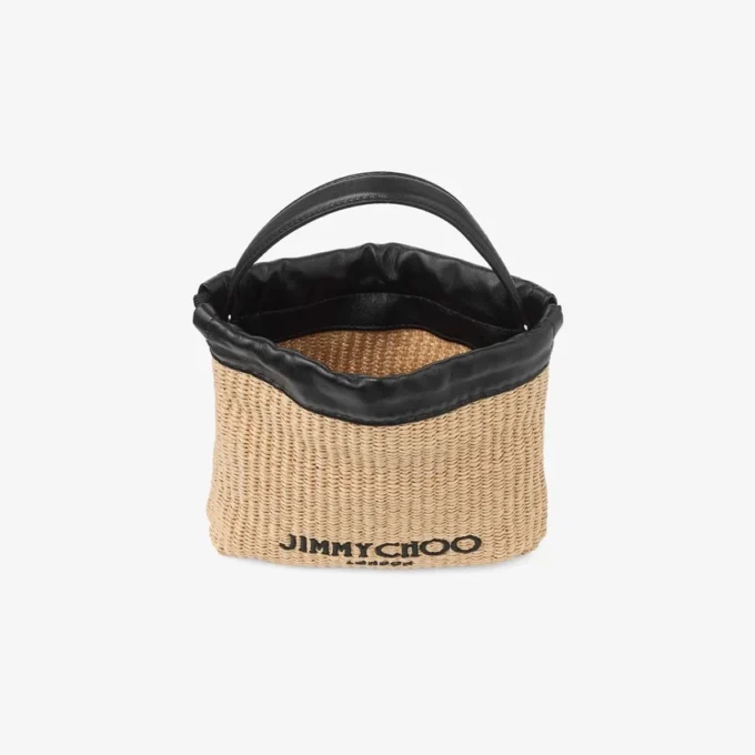 Dragsko-påse med handtag i naturfärgad och svart mjuk raffia med läderkant Dragsko-påse med handtag i naturfärgad och svart mjuk raffia med läderkant