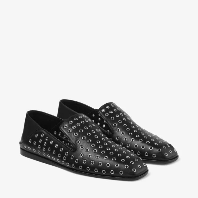Eliot Slipper Svarta tofflor i metalliskt nappaläder med öljetter