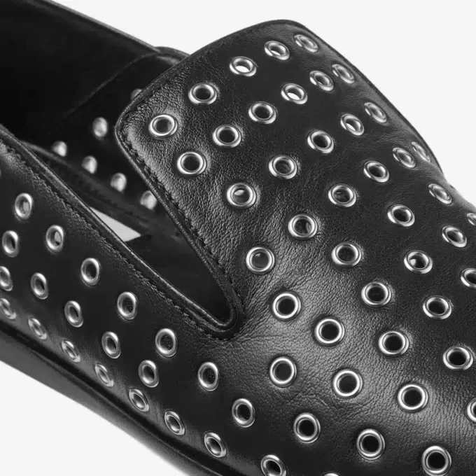 Eliot Slipper Svarta tofflor i metalliskt nappaläder med öljetter