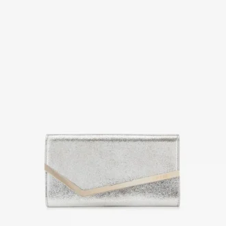 Emmie-clutchväska i champagnefärgat glitterläder