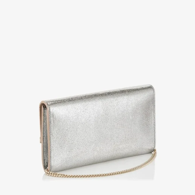 Emmie-clutchväska i champagnefärgat glitterläder Emmie-clutchväska i champagnefärgat glitterläder