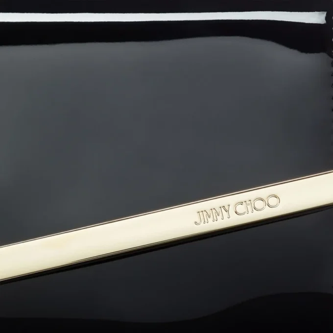 Emmie svart lackläderclutch Emmie svart lackläderclutch