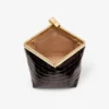 Ganache Sambuco glänsande clutchväska i läder med krokodilprägling Ganache Sambuco glänsande clutchväska i läder med krokodilprägling