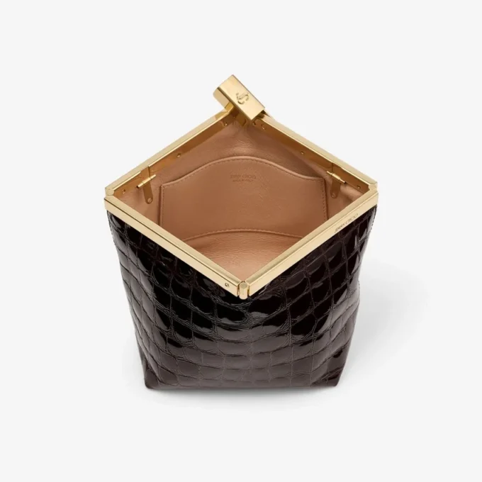 Ganache Sambuco glänsande clutchväska i läder med krokodilprägling Ganache Sambuco glänsande clutchväska i läder med krokodilprägling