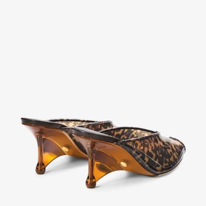 Glace Mule 80 Sandaler i TPU i en blandning av bärnstensfärgat och brunt sköldpaddsmönster med kilklack i plexiglas Glace Mule 80 Sandaler i TPU i en blandning av bärnstensfärgat och brunt sköldpaddsmönster med kilklack i plexiglas