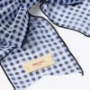 Hårspänne med rosett Hårspänne med rosett i marinblå mini-gingham-organza