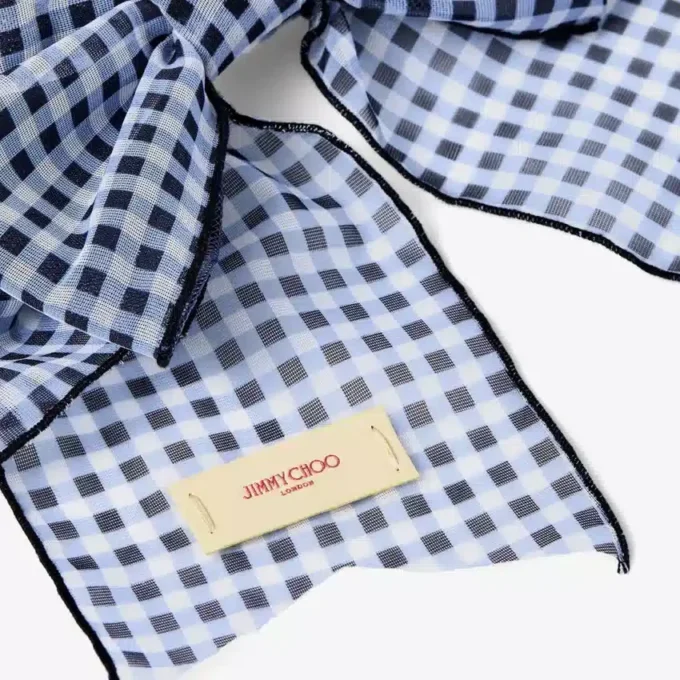 Hårspänne med rosett Hårspänne med rosett i marinblå mini-gingham-organza