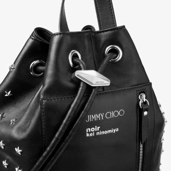 Jimmy Choo Noir Kei Ninomiya ryggsäck  Svart ryggsäck i nappaläder med metalliska stjärndekorationer
