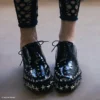 Jimmy Choo Noir Kei Ninomiya Star Skor Svarta snörskor i polerat kalvskinn med stjärndekoration Jimmy Choo Noir Kei Ninomiya Star Skor Svarta snörskor i polerat kalvskinn med stjärndekoration