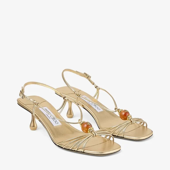 Lova 50 sandaler i guldmetalliskt nappaläder med pärlor Lova 50 sandaler i guldmetalliskt nappaläder med pärlor