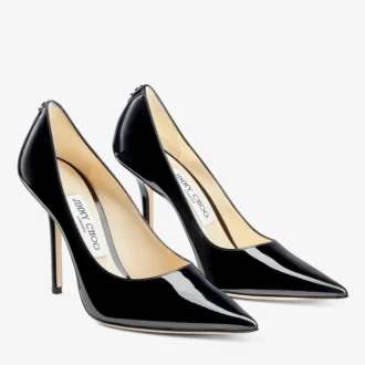 Love 100 svarta pumps i lackläder med spetsig tå och JC-emblem