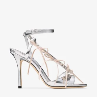 Lula 100 silver- och macaronfärgade sandaler i Liquid Metal-läder med sammetrosetter