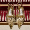 Mimmi  Sling Back 50 Guldfärgade slingbacks i Liquid Metal-läder med perforerad jimmy choo-korsett