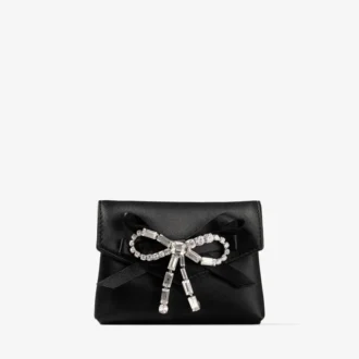 Mjuk kortplånbok med kedja Svart kortplånbok i satin med kristallrosett Mjuk kortplånbok med kedja Svart kortplånbok i satin med kristallrosett