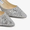 Romy 60 spetsiga pumps i grovt glittertyg i champagne Romy 60 spetsiga pumps i grovt glittertyg i champagne